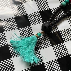 Hand assembled beaded necklace turquoise tassel